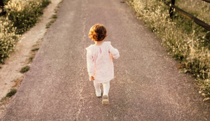 a child walking alone